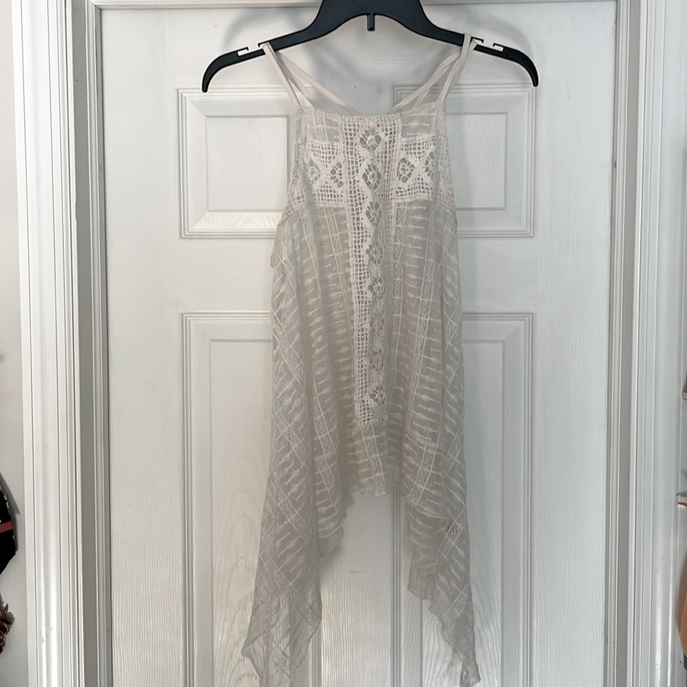 Asymmetrical white flowy tank